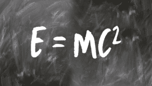 E=MC² written on a chalk board.